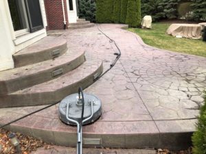 Stamped Concrete Patio in Washington Twp. before Pressure Wash