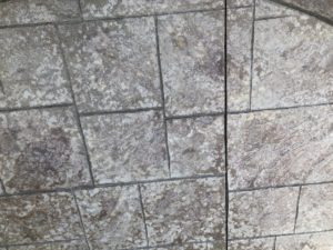 Stamped Concrete With moisture trapped in sealer