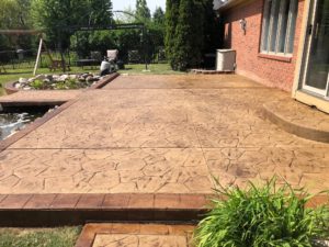 Stamped Concrete Patio after paint removed and sealer applied, Macomb Twp.